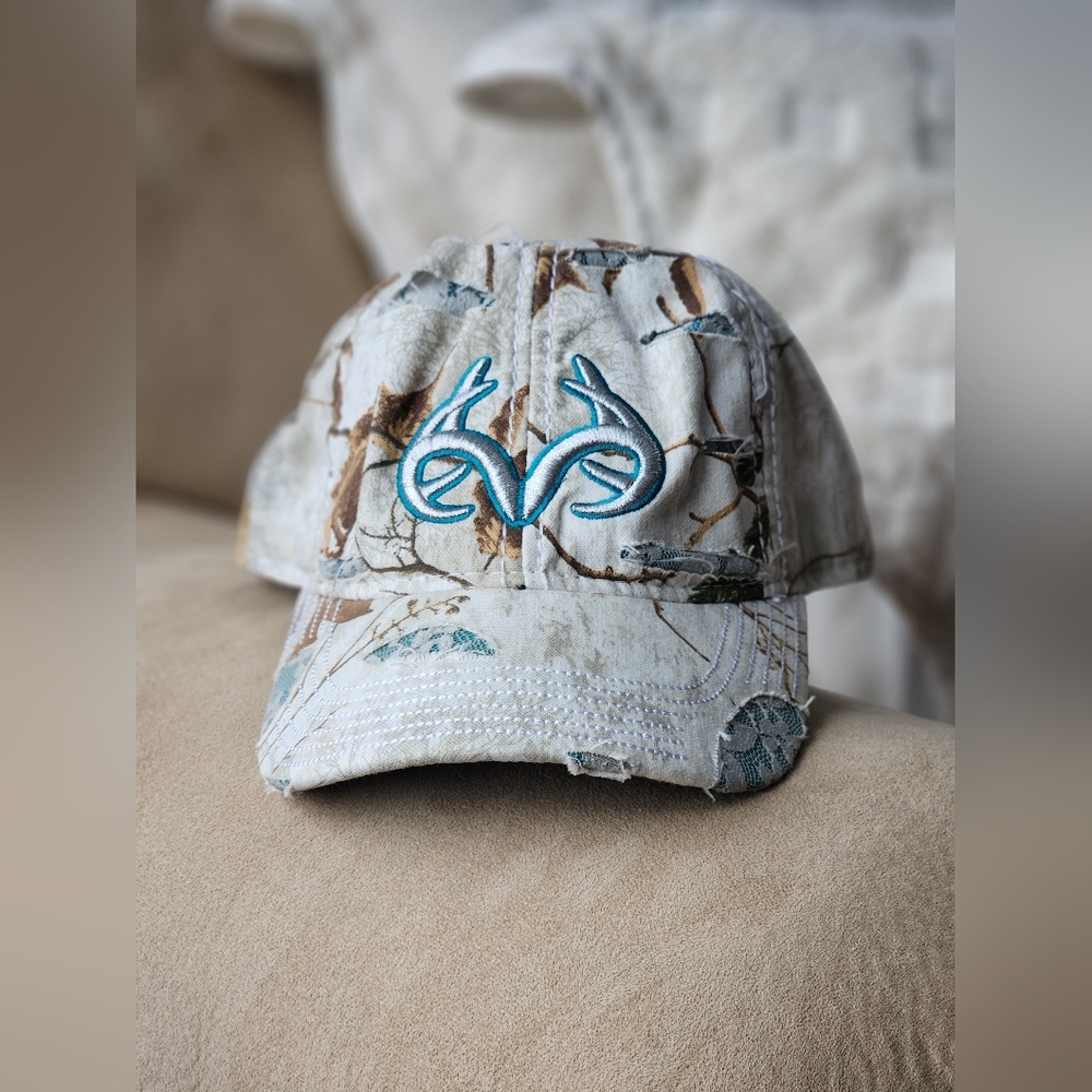 Realtree white camo and teal baseball hat